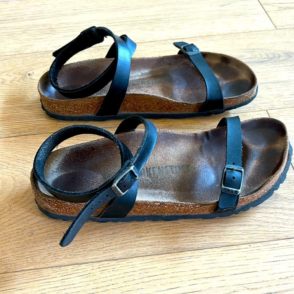 Birkenstock ankle wrap sandals.